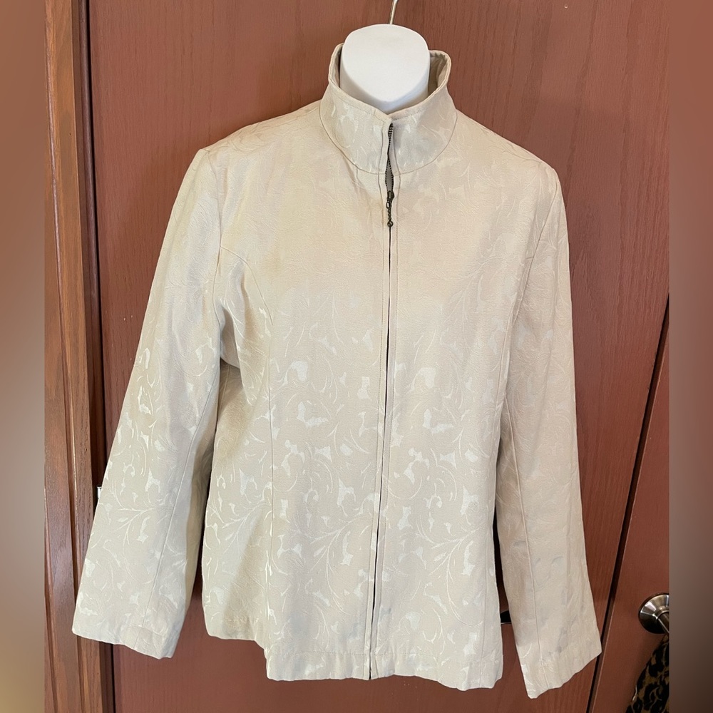Large fully lined sport zip up jacket.